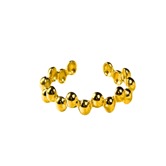 Gold beaded ring on a white background