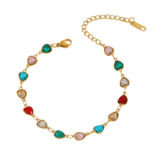 Gold bracelet with colorful gemstones on a white background