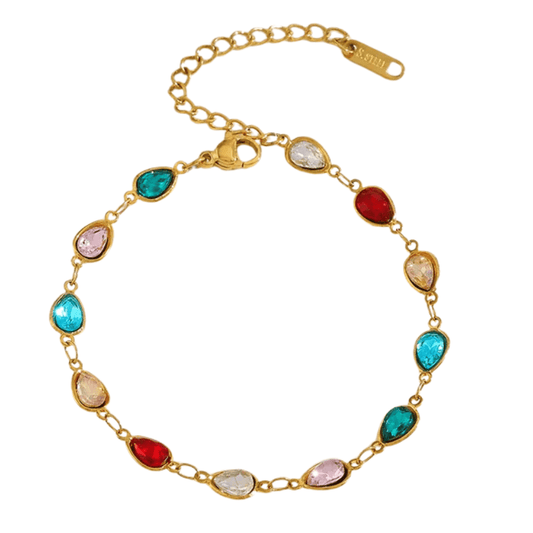 Gold bracelet with colorful gemstones on a white background