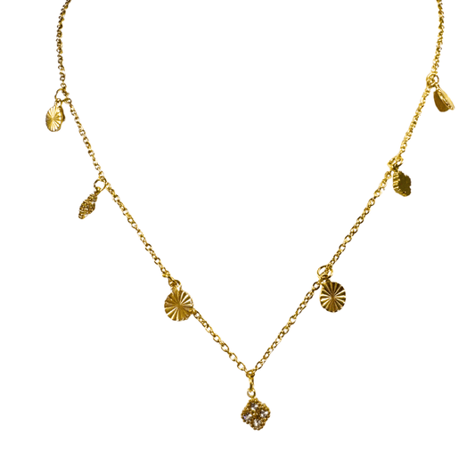 Gold necklace with various pendants on a white background