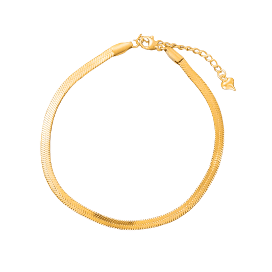 Gold bracelet on a white background