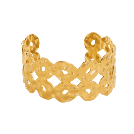 Gold bracelet with intricate design on a white background