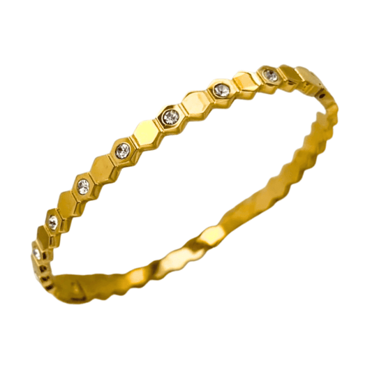 Silver ring with a heart-shaped gemstone on a white background