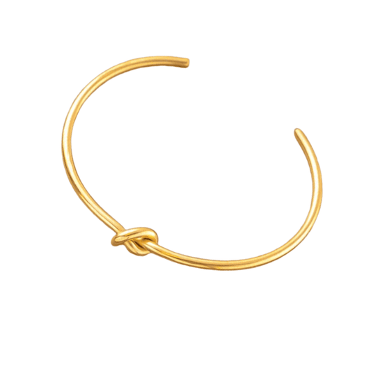 Gold hoop earring with a knot design on a white background