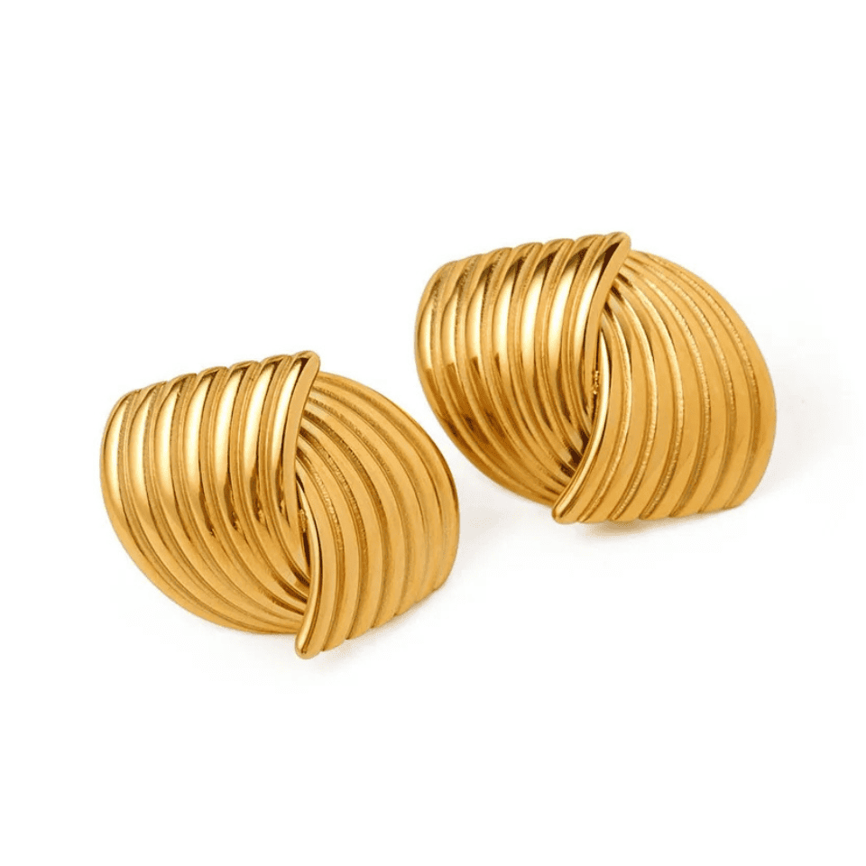 Pair of gold hoop earrings on a white background