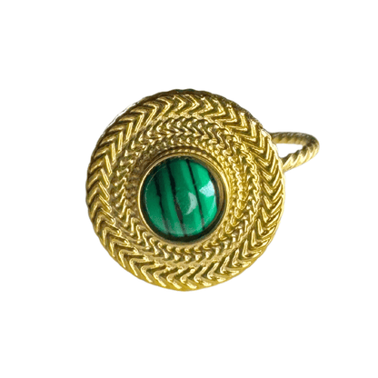 Gold pendant with a green stone on a white background
