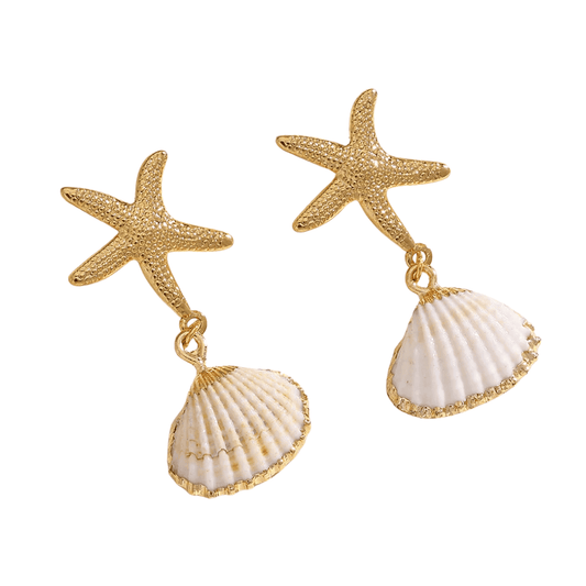 Gold starfish and shell earrings on a white background