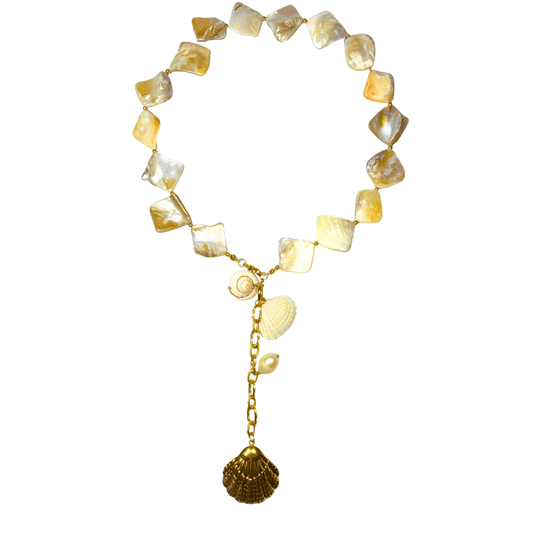 Necklace with yellow and white heart-shaped beads and a gold chain on a white background