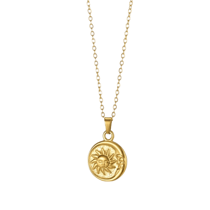 Gold necklace with a sun pendant on a white background
