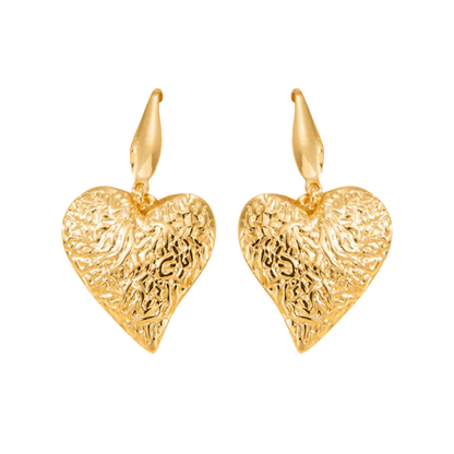Gold heart-shaped earrings on a white background