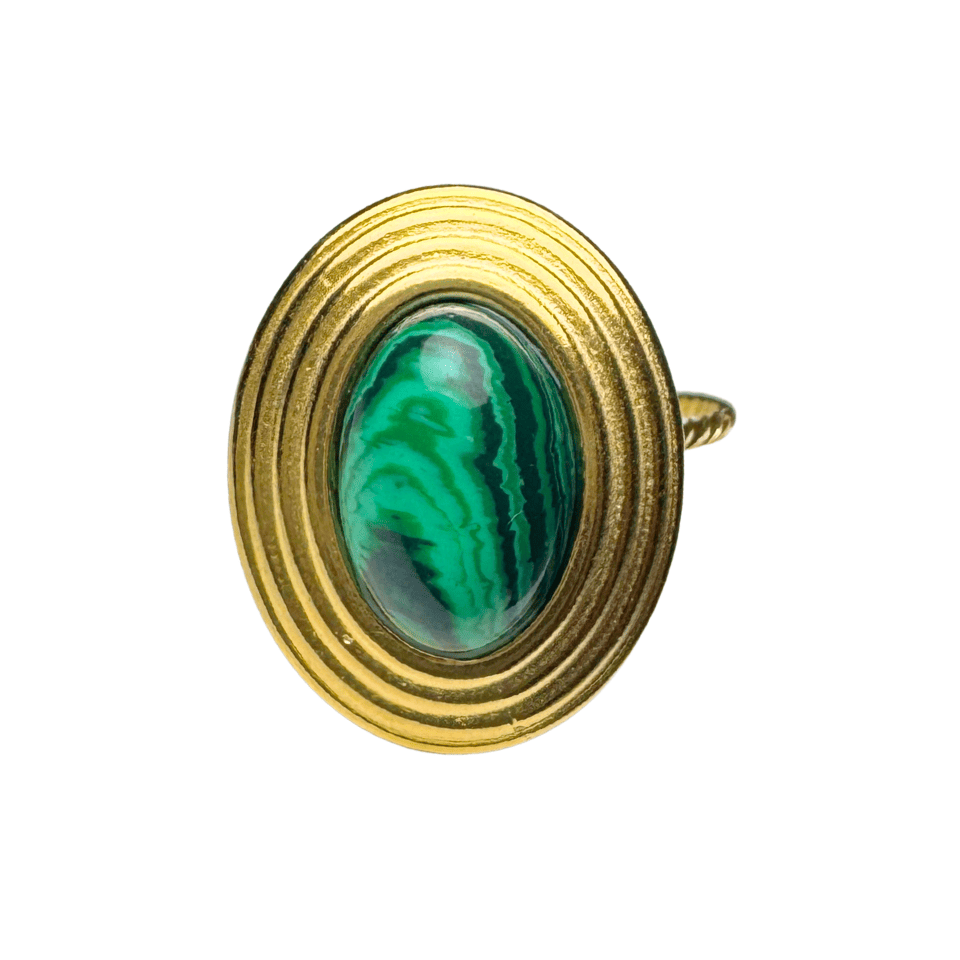 Gold ring with a green malachite stone on a white background