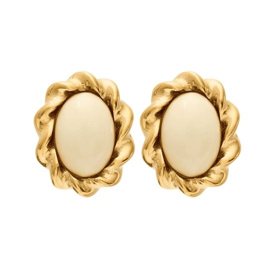Pair of gold earrings with beige centers on a white background