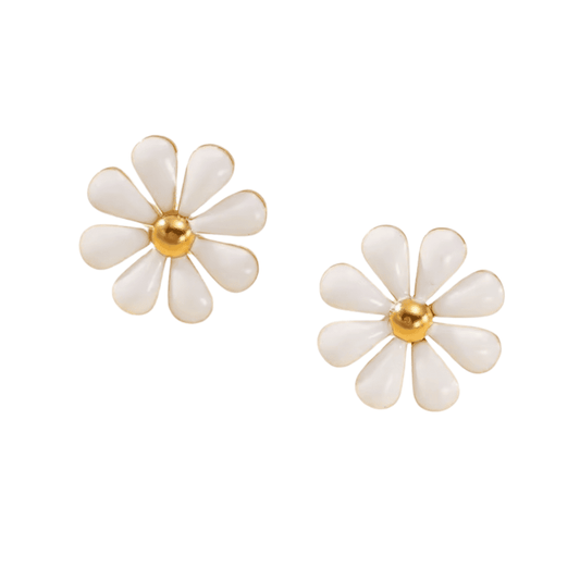 White flower-shaped earrings with gold centers on a white background