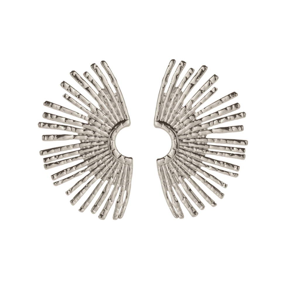 Pair of silver sunburst earrings on a white background