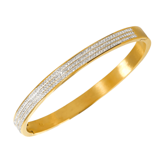 Gold bracelet with diamond accents on a white background